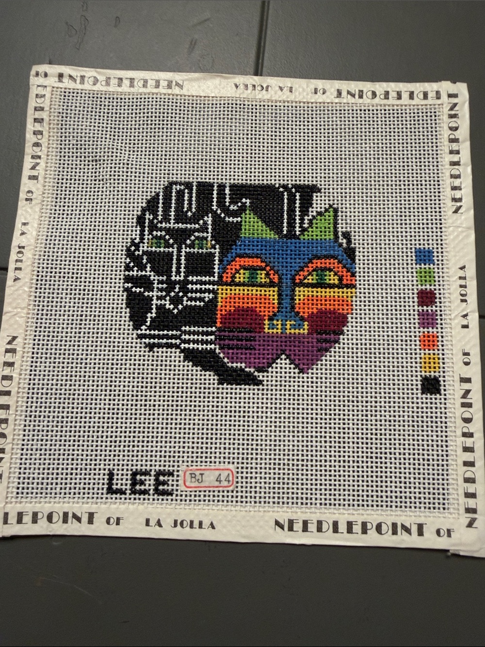 needlepoint canvas features a stylized cat byBJ for Lee Needle Arts.🐈‍⬛